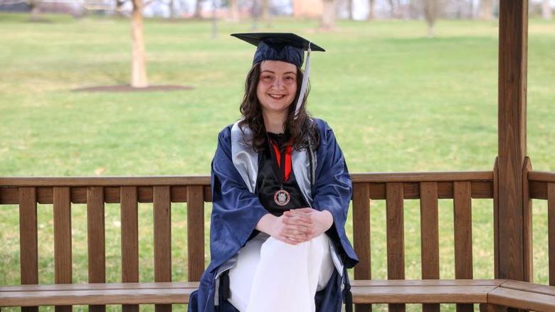 Kaitlyn Pio wearing cap and gown